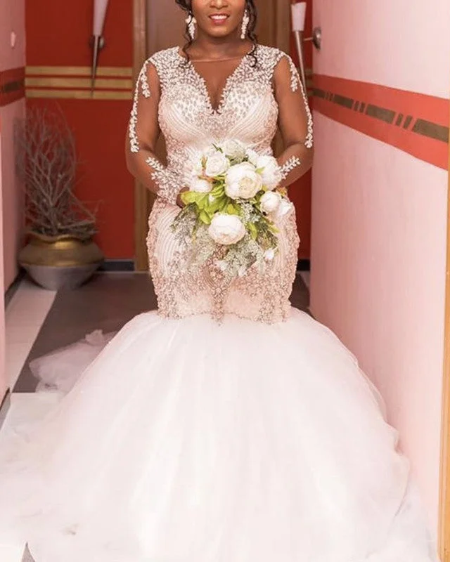 Fit - and - flare wedding dress with a big bowCrystal Beaded Mermaid Wedding Dress Long Sleeves Fit - and - flare wedding dress with a big bowCrystal Beaded Mermaid Wedding Dress Long Sleeves