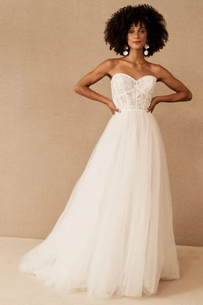 Peplum - style wedding dress for a flattering silhouetteBHLDN Wtoo Clarinda Gown