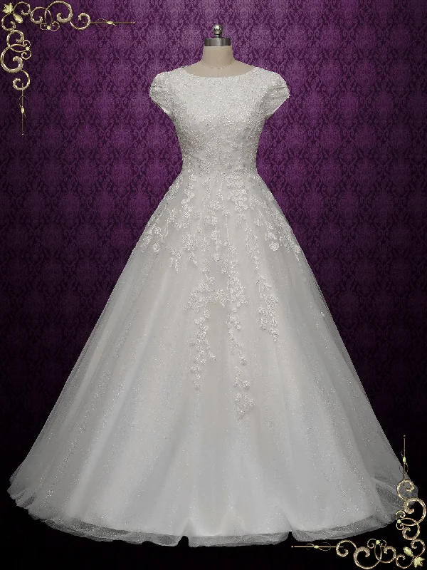 Plus - size A - line wedding dress for a comfortable fitModest Lace Wedding Dress with Cap Sleeves AUBREE Plus - size A - line wedding dress for a comfortable fitModest Lace Wedding Dress with Cap Sleeves AUBREE