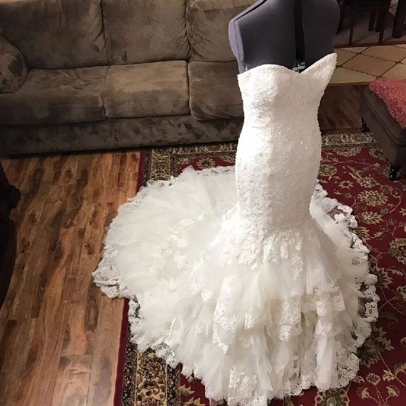 Cut - out detail modern wedding dressRomantic Sweetheart Bodice Corset Lace Mermaid Wedding Dress With Ruffles Skirt Cut - out detail modern wedding dressRomantic Sweetheart Bodice Corset Lace Mermaid Wedding Dress With Ruffles Skirt