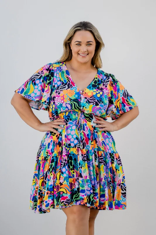 Dresses with Ruffled Hem and Bow at the Waist for Ladies' Sweet and Feminine LookCharlie Dress in Electric Zee by Kasey Rainbow Dresses with Ruffled Hem and Bow at the Waist for Ladies' Sweet and Feminine LookCharlie Dress in Electric Zee by Kasey Rainbow