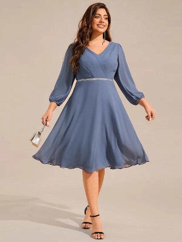 "Plus size wedding dresses for women with a perfect fit"Plus Size Long Sleeve Midi A-Line Wedding Guest Dress with Waist Chain